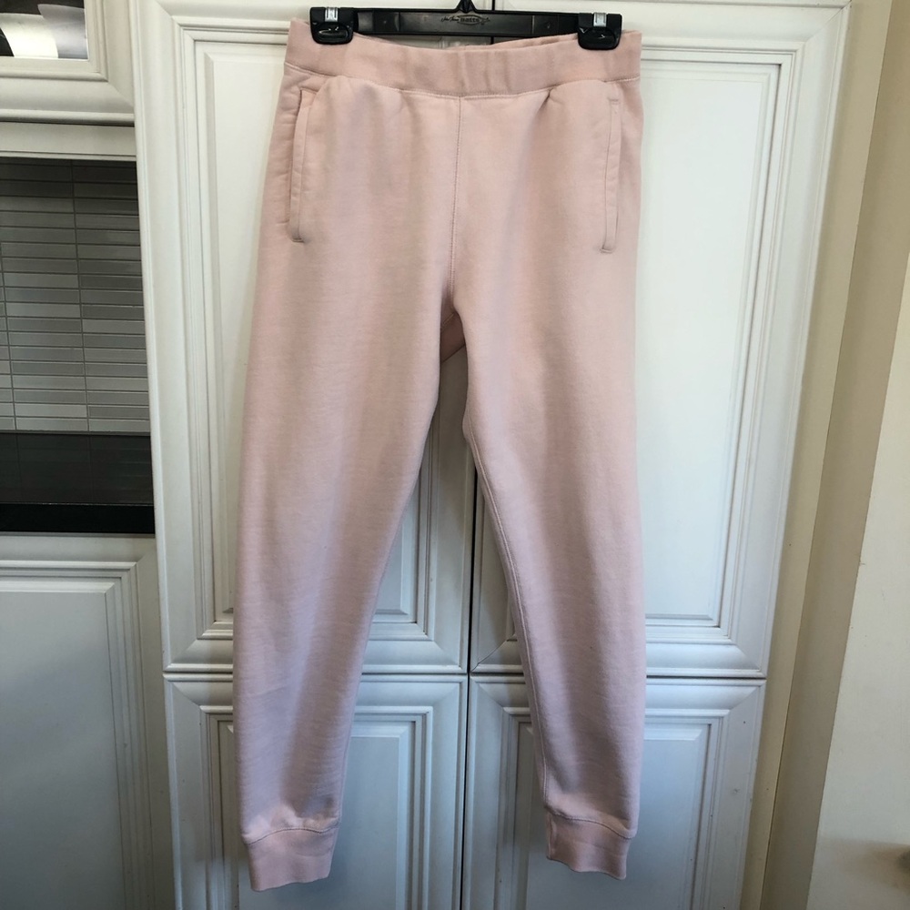 Roots womenโs pale pink sweatpants